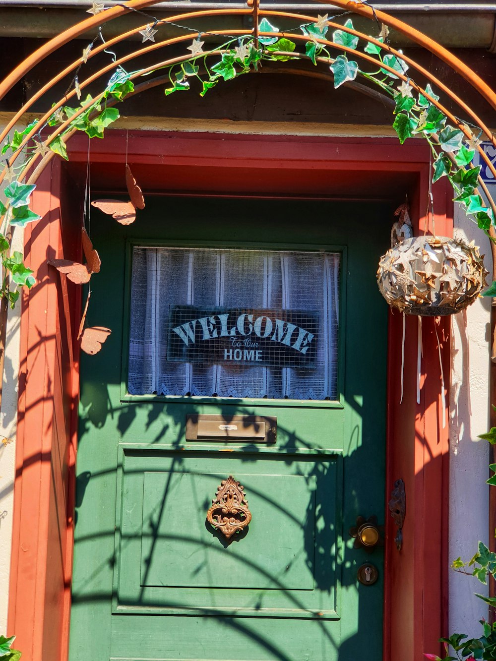 a green door with a sign on it