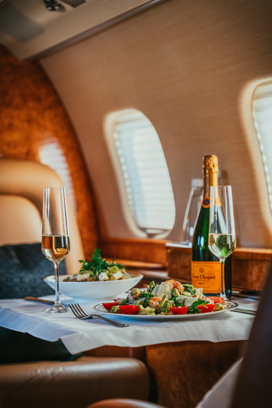 Elegant table setting with food and wine