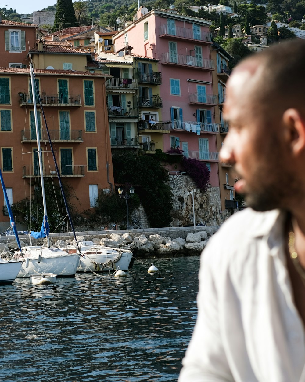 a man standing on a boat in the water