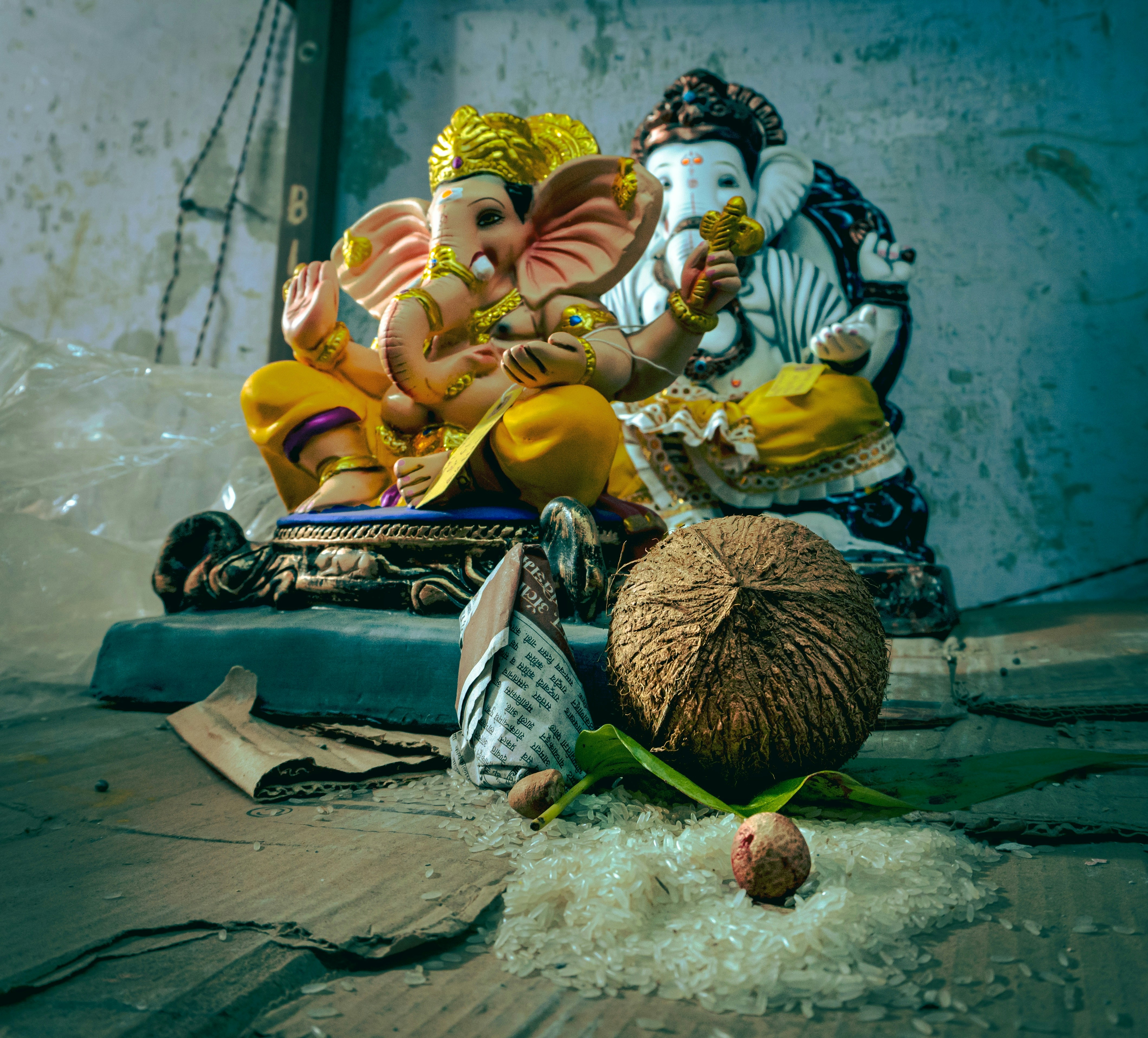 a couple of people sitting on a pile of garbage