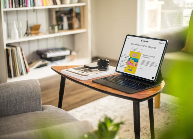 a laptop on a coffee table