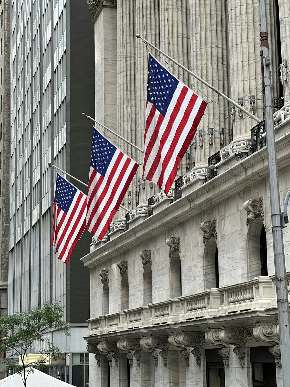 a couple of flags on a building