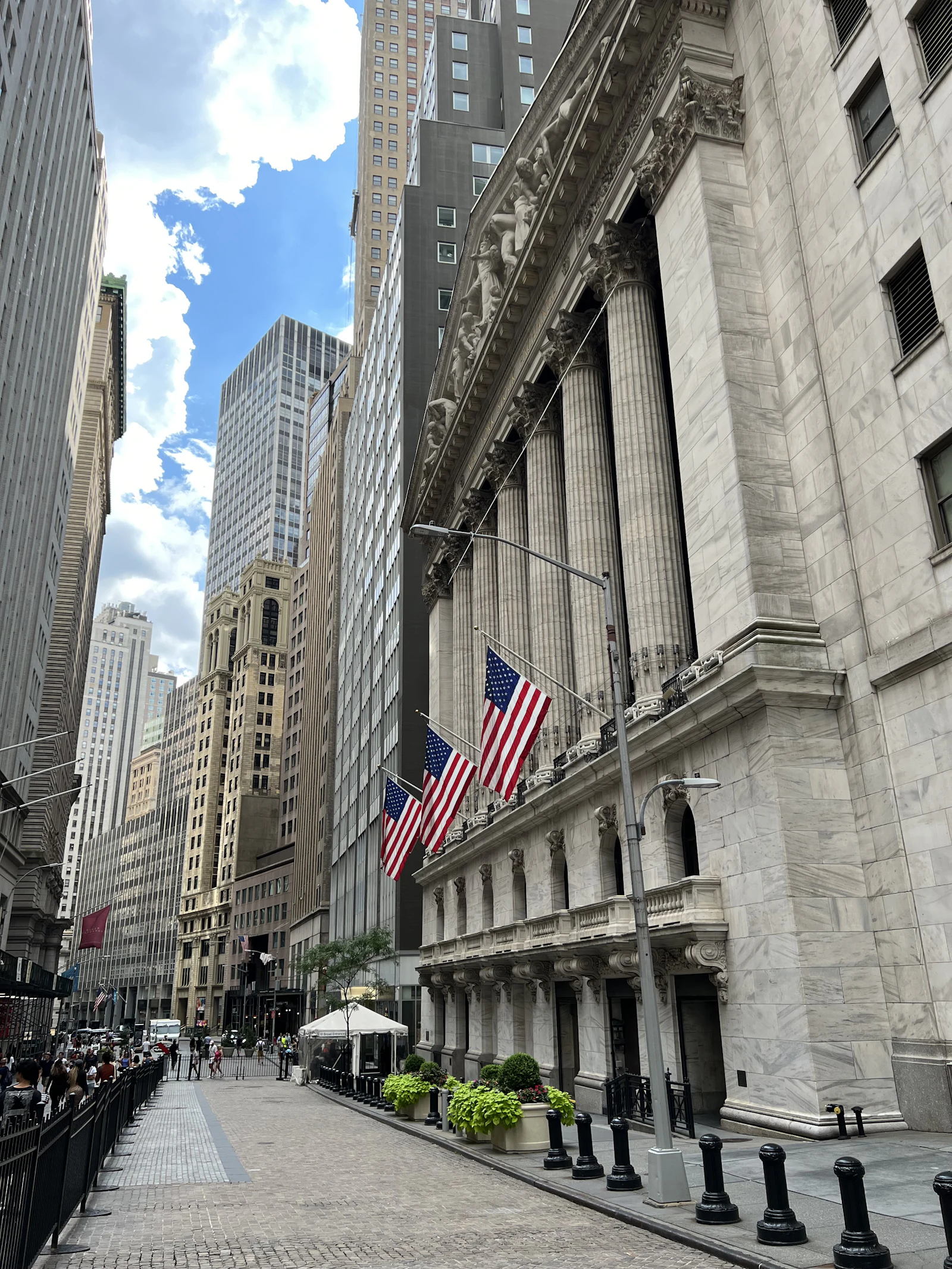 Wall Street financial district with American flags