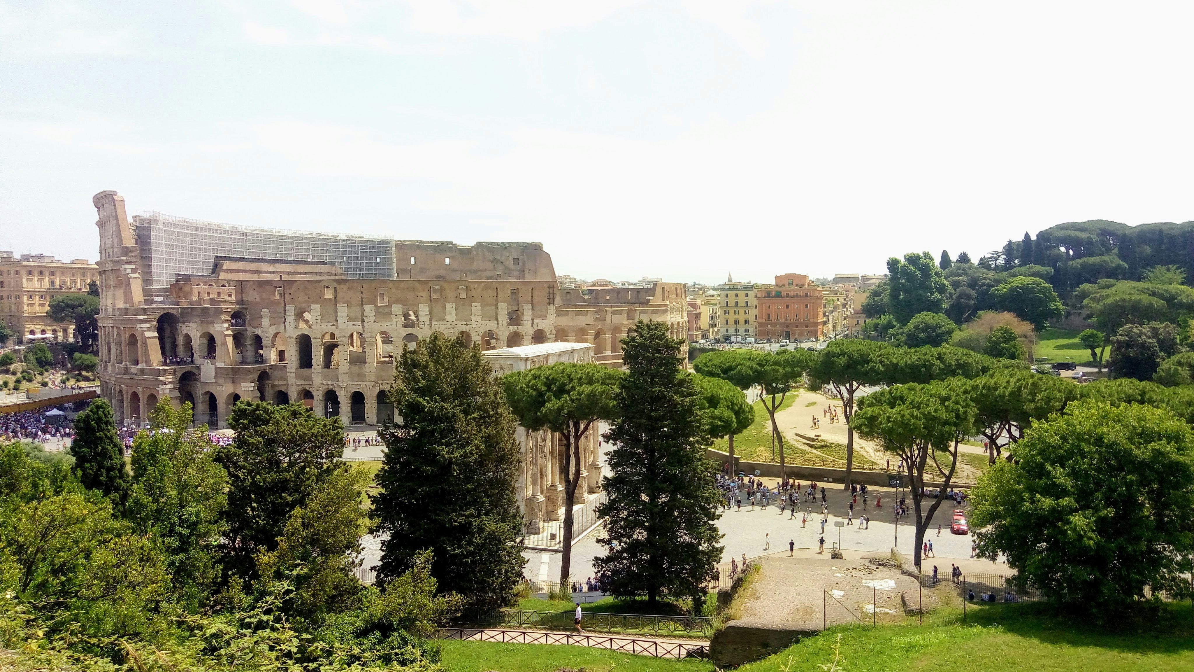 a large building with trees in front of it