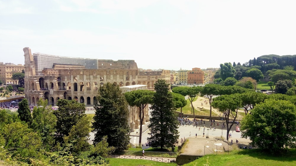 a large building with trees in front of it