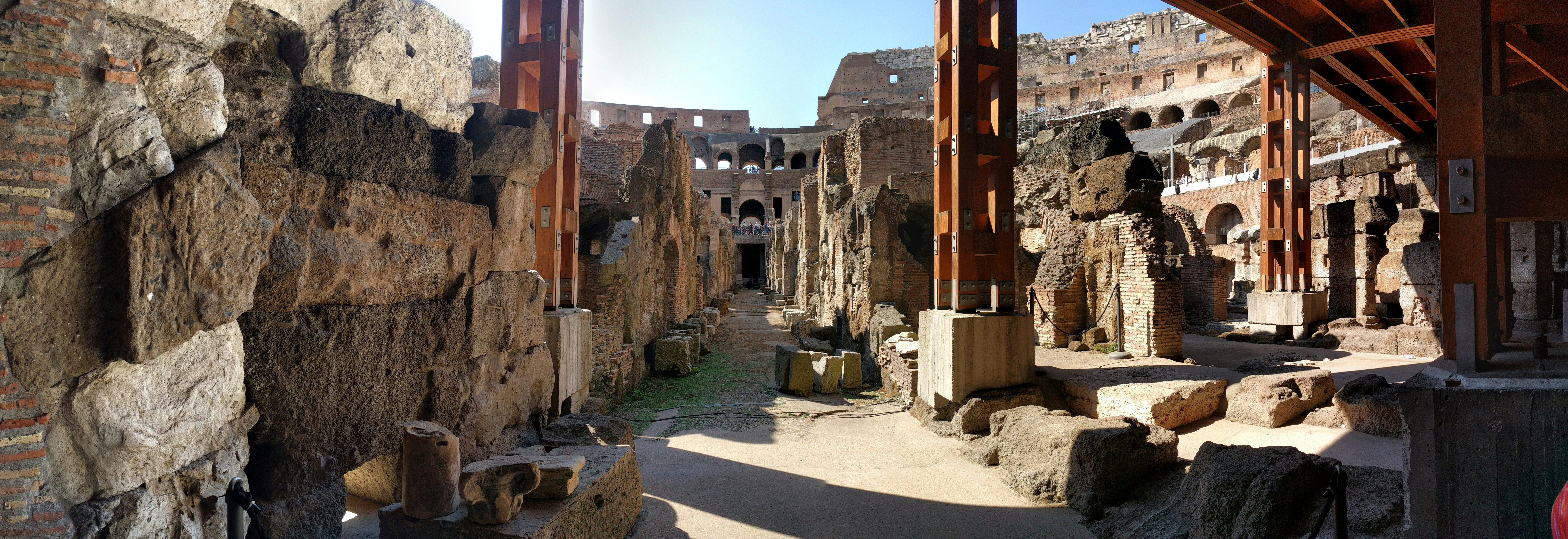 a stone building with a walkway