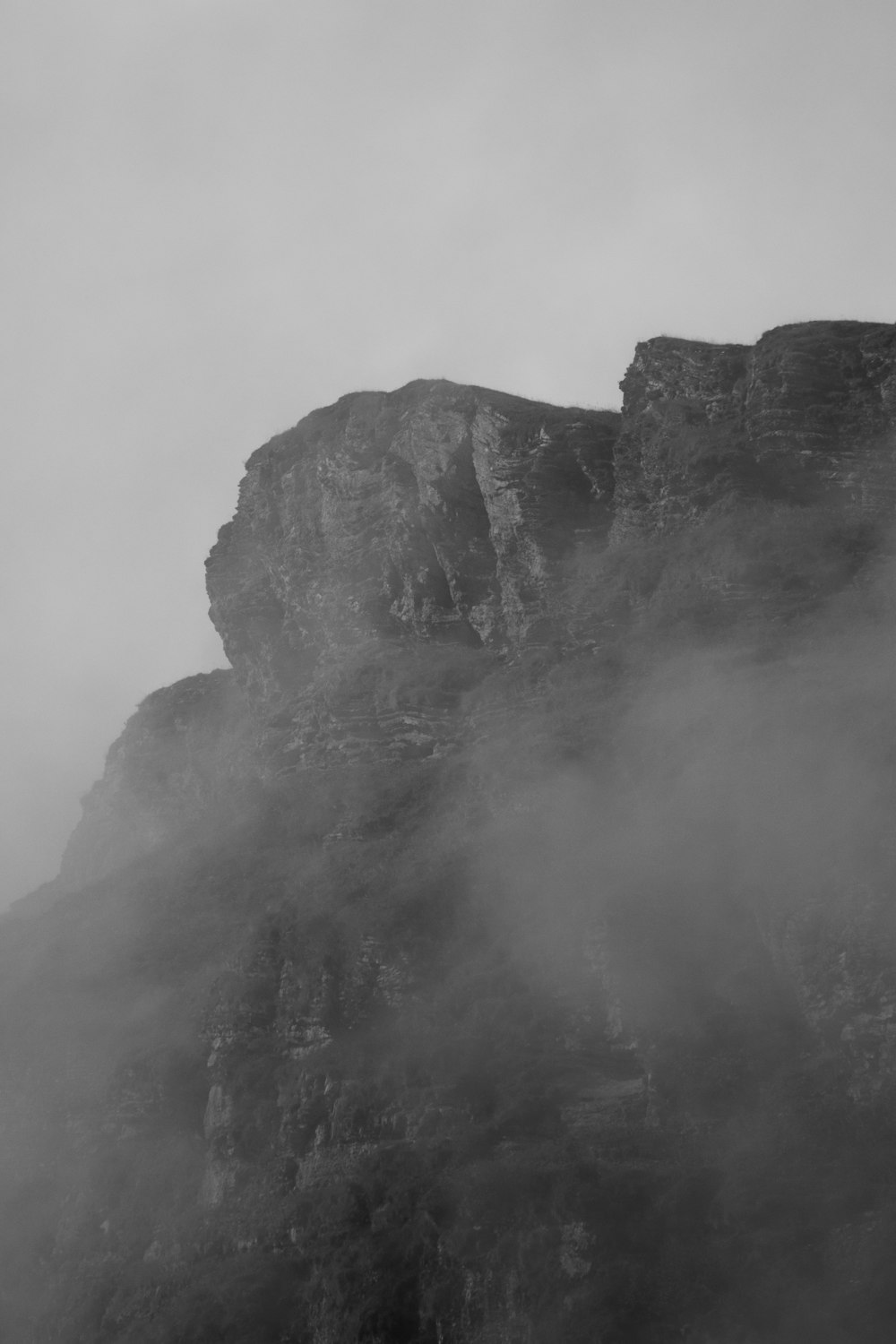 a mountain with fog