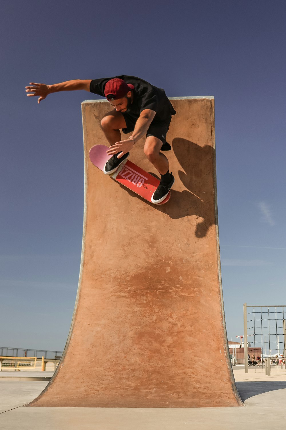 a man doing a trick on a skateboard