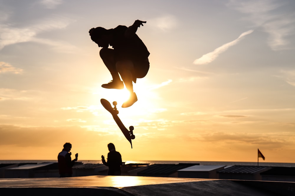 a person jumping with a skateboard