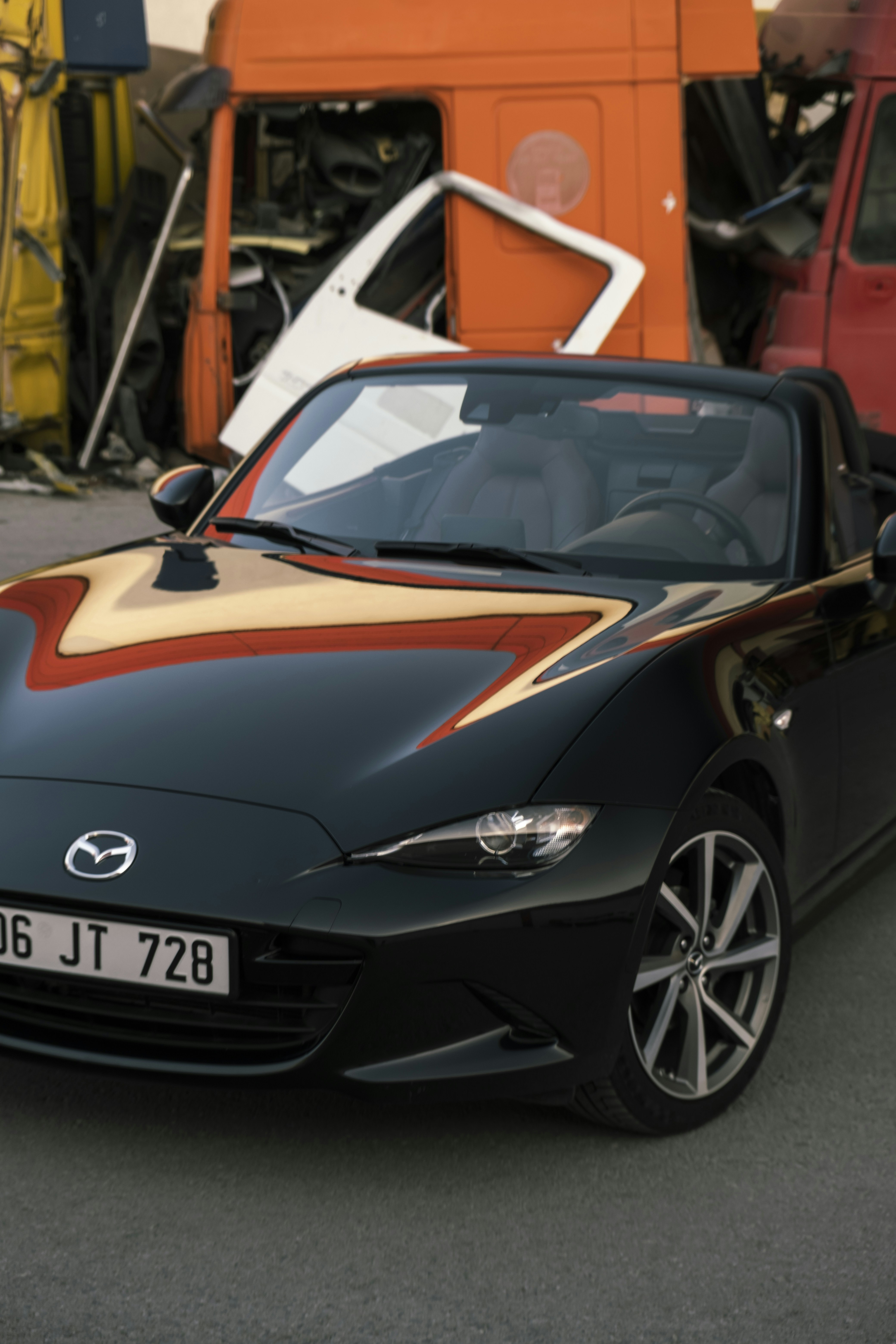 a black car with a spoiler