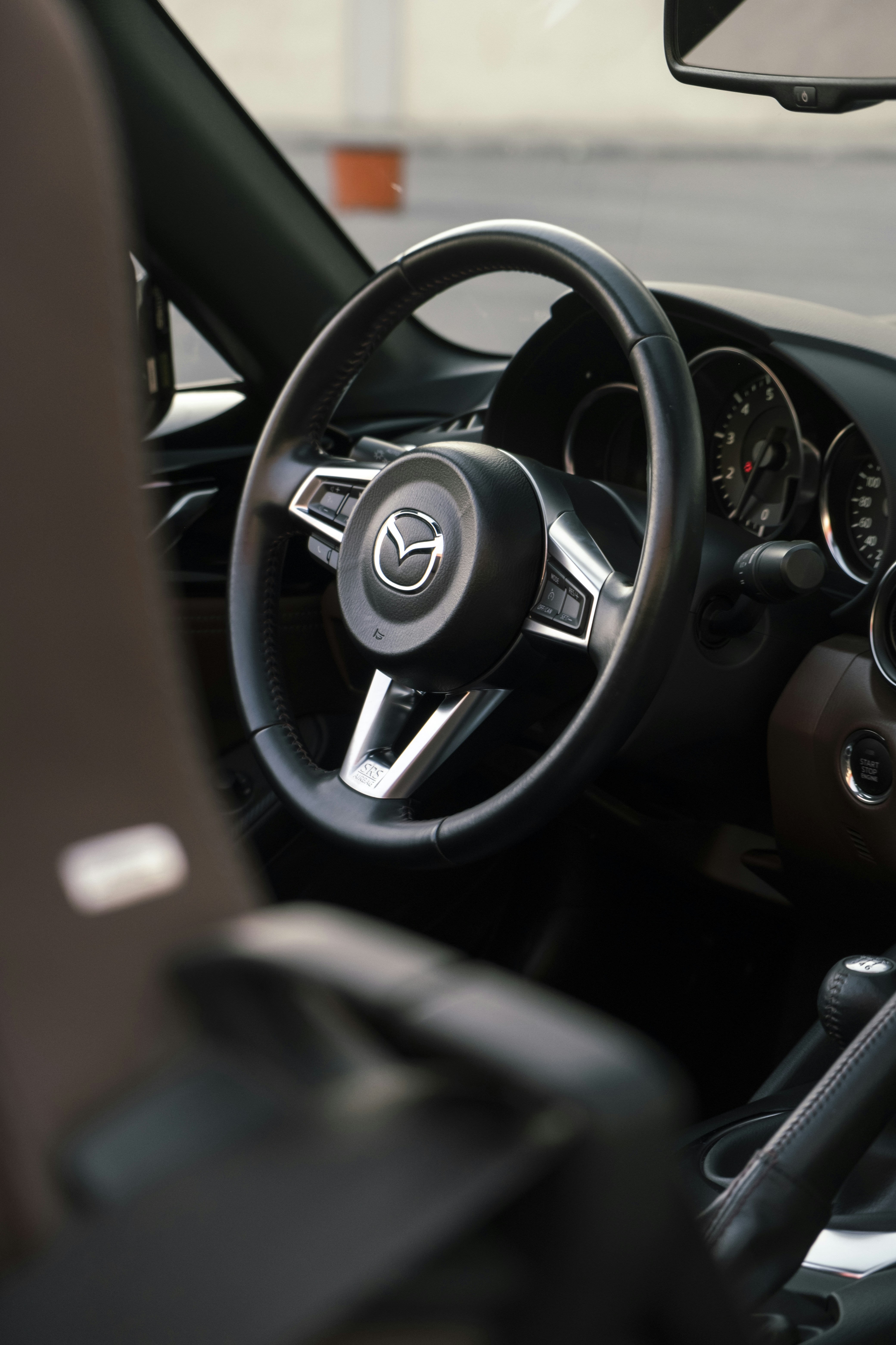 a steering wheel and dashboard of a car