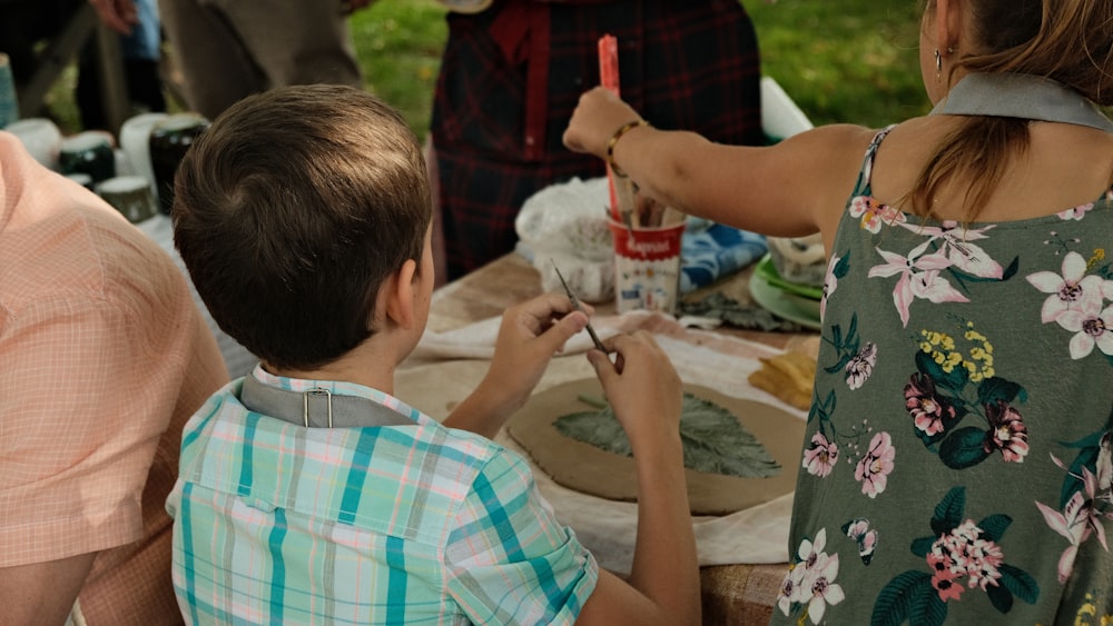 a person painting a child's picture