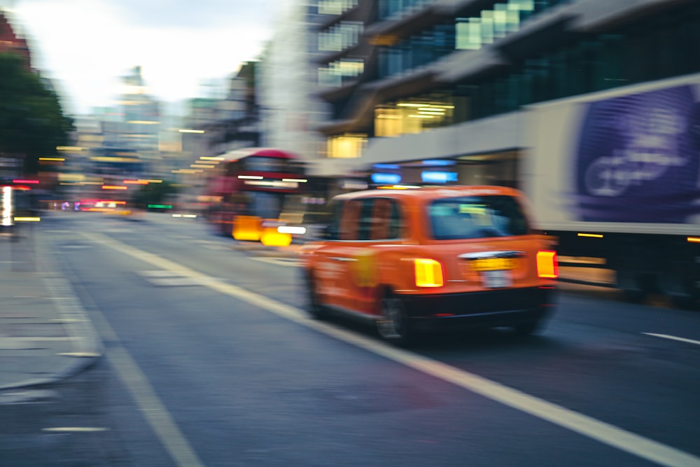 a taxi driving down the street