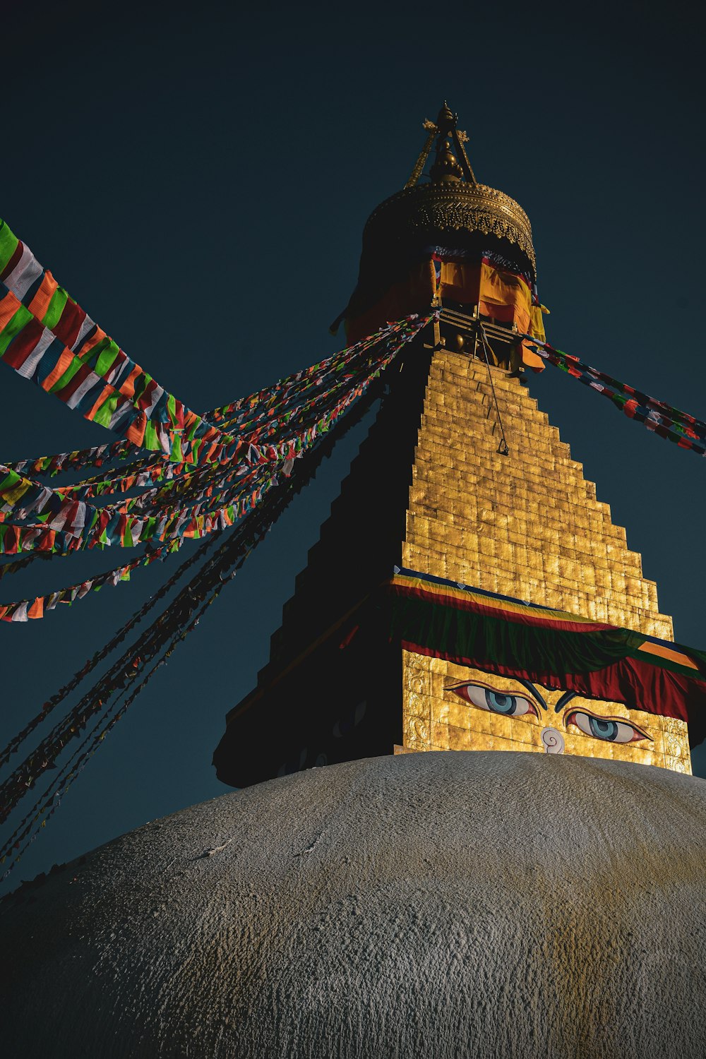 a large tower with colorful lights