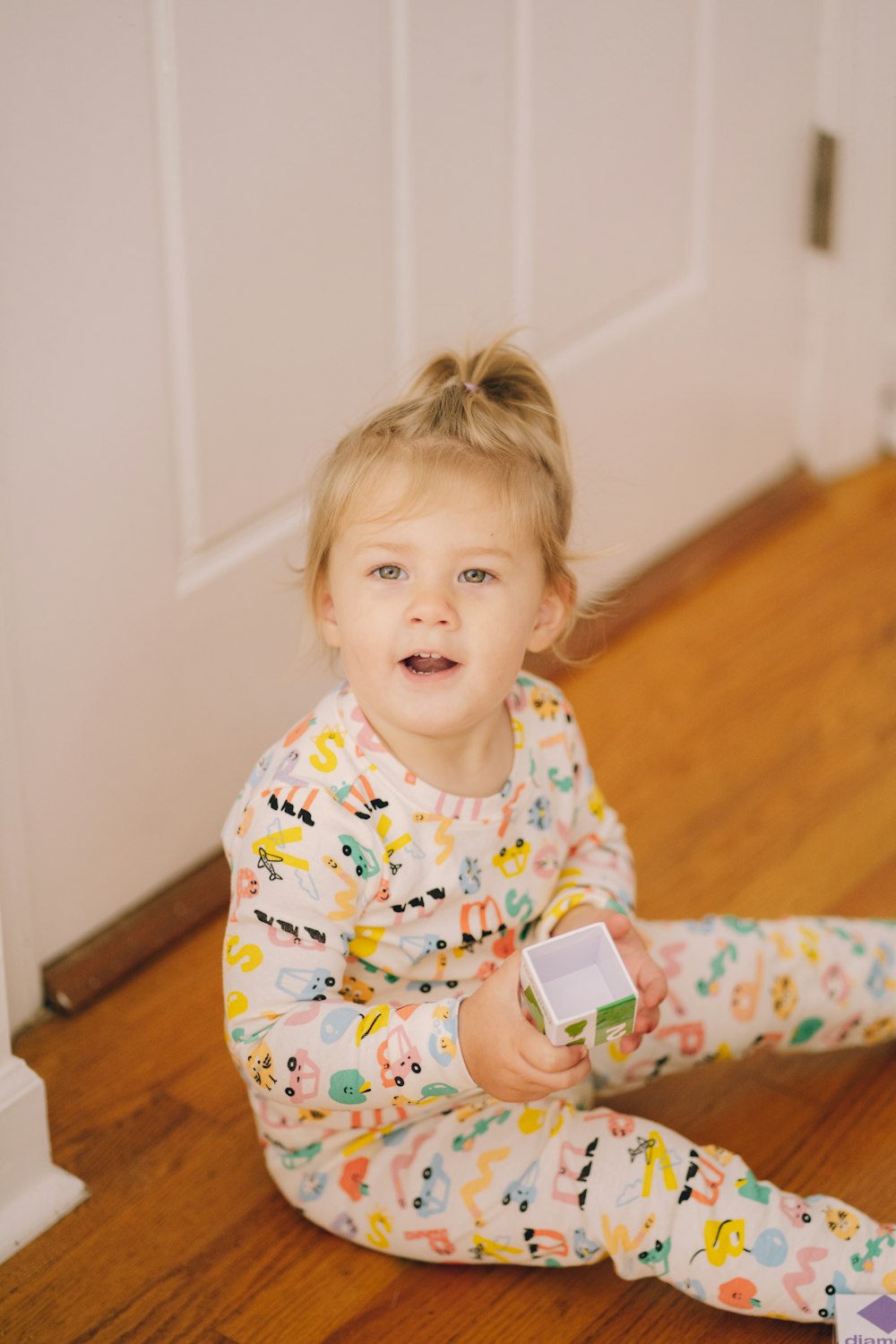 a child holding a card