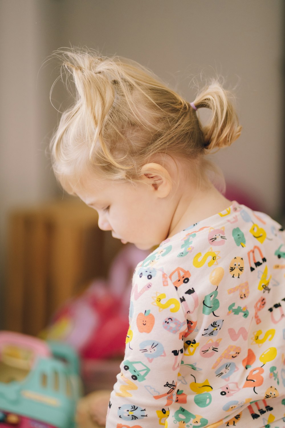 a little girl with her hair blowing in the wind