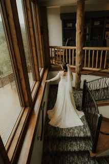 a person in a wedding dress on a staircase