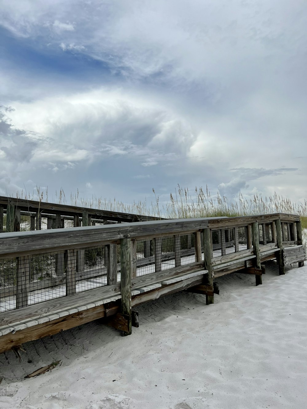 a wooden fence in the snow