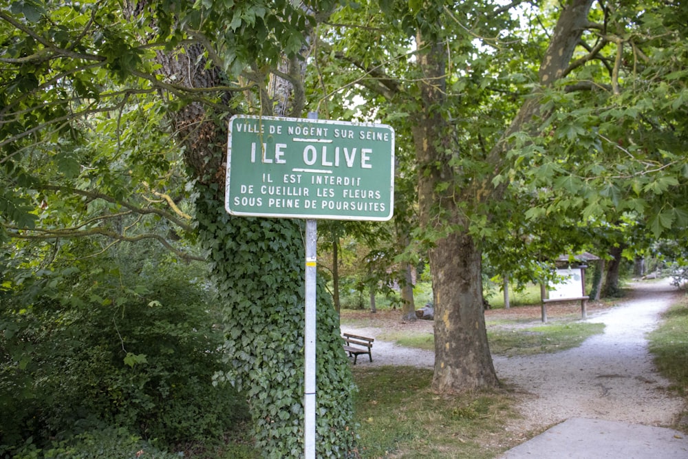 a sign in a park