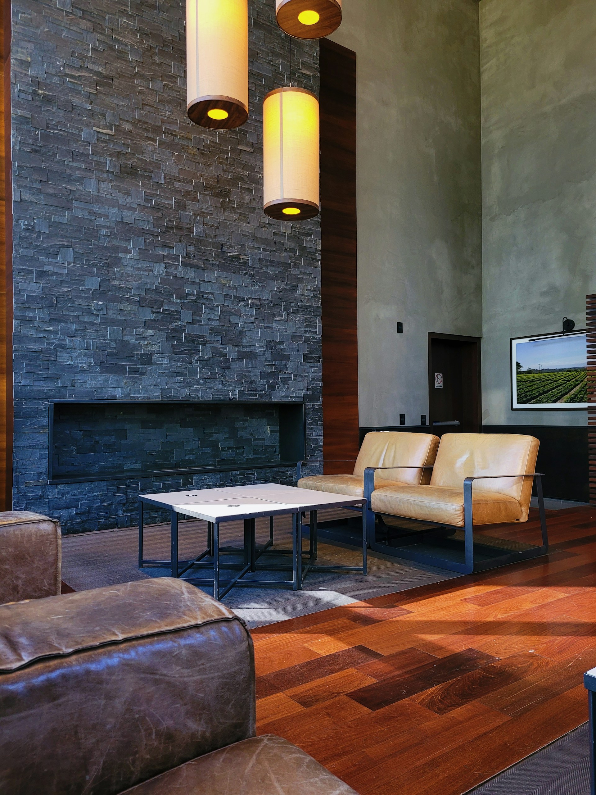 a room with a fireplace and a table
