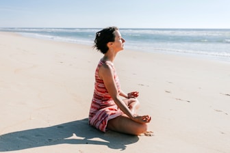 a person sitting on a beach