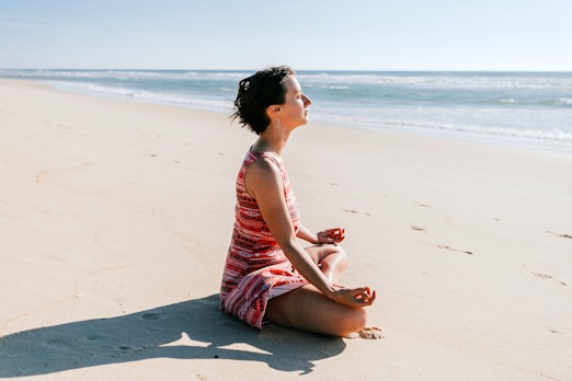 a person sitting on a beach
