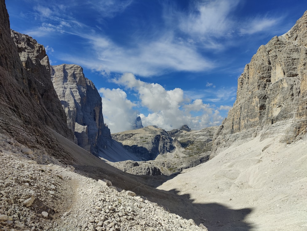 a rocky canyon with a road