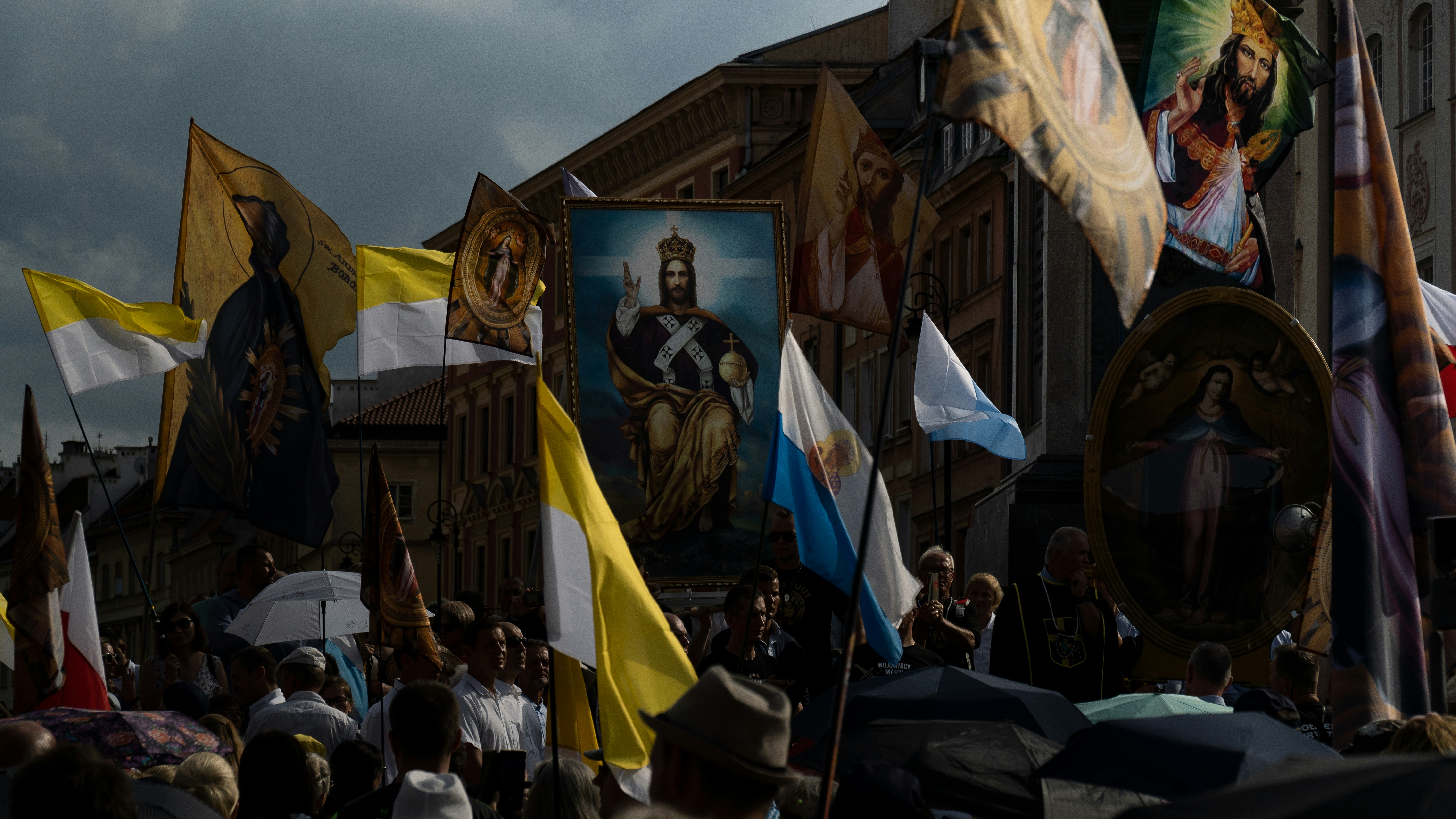 a group of people holding flags
