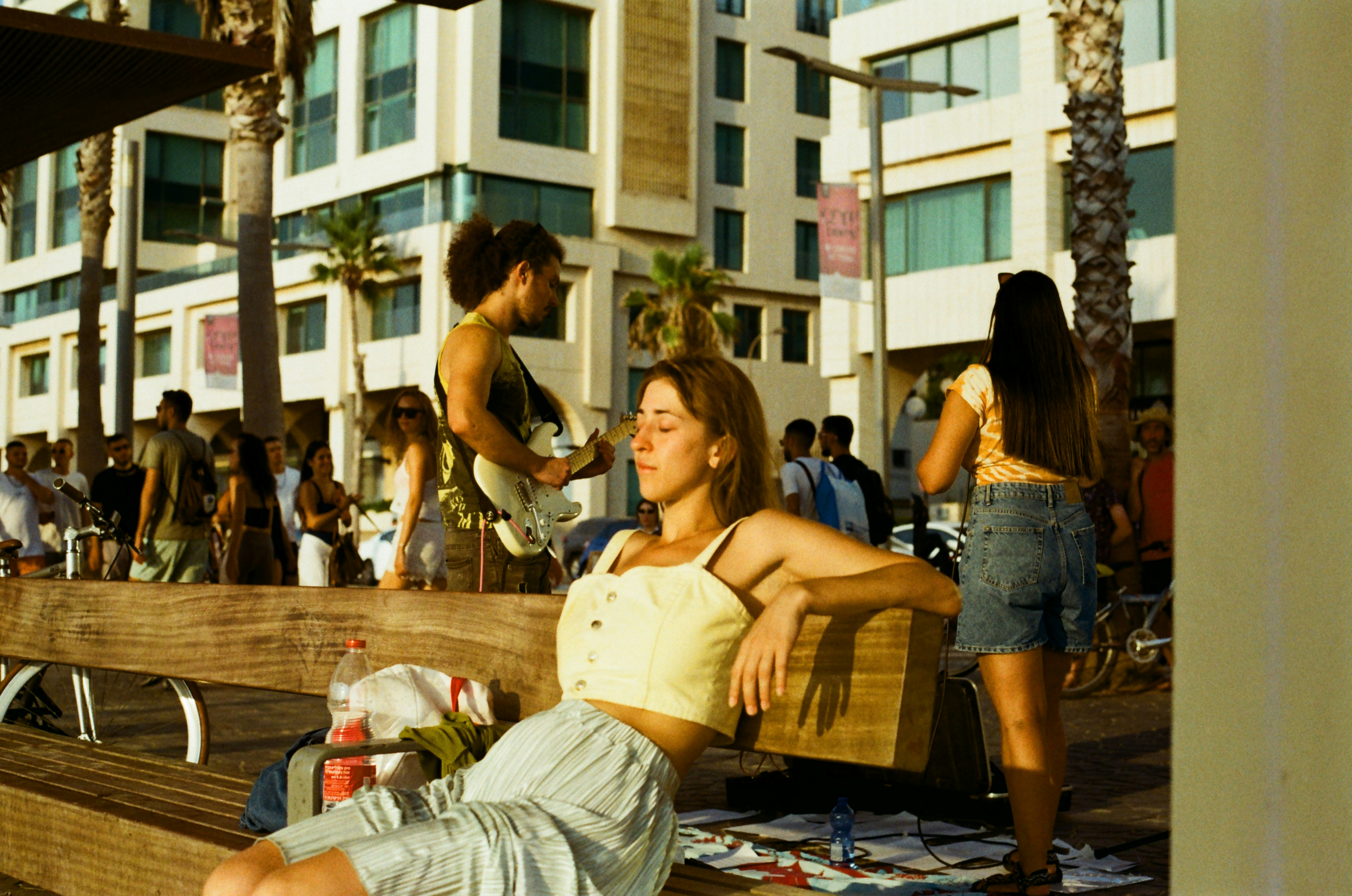 a woman sitting on a bench