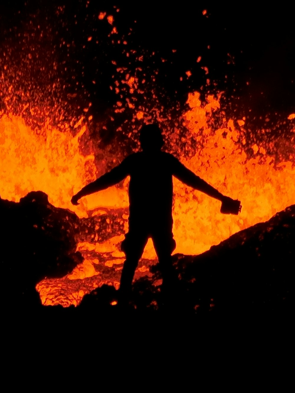 a person standing on a rock