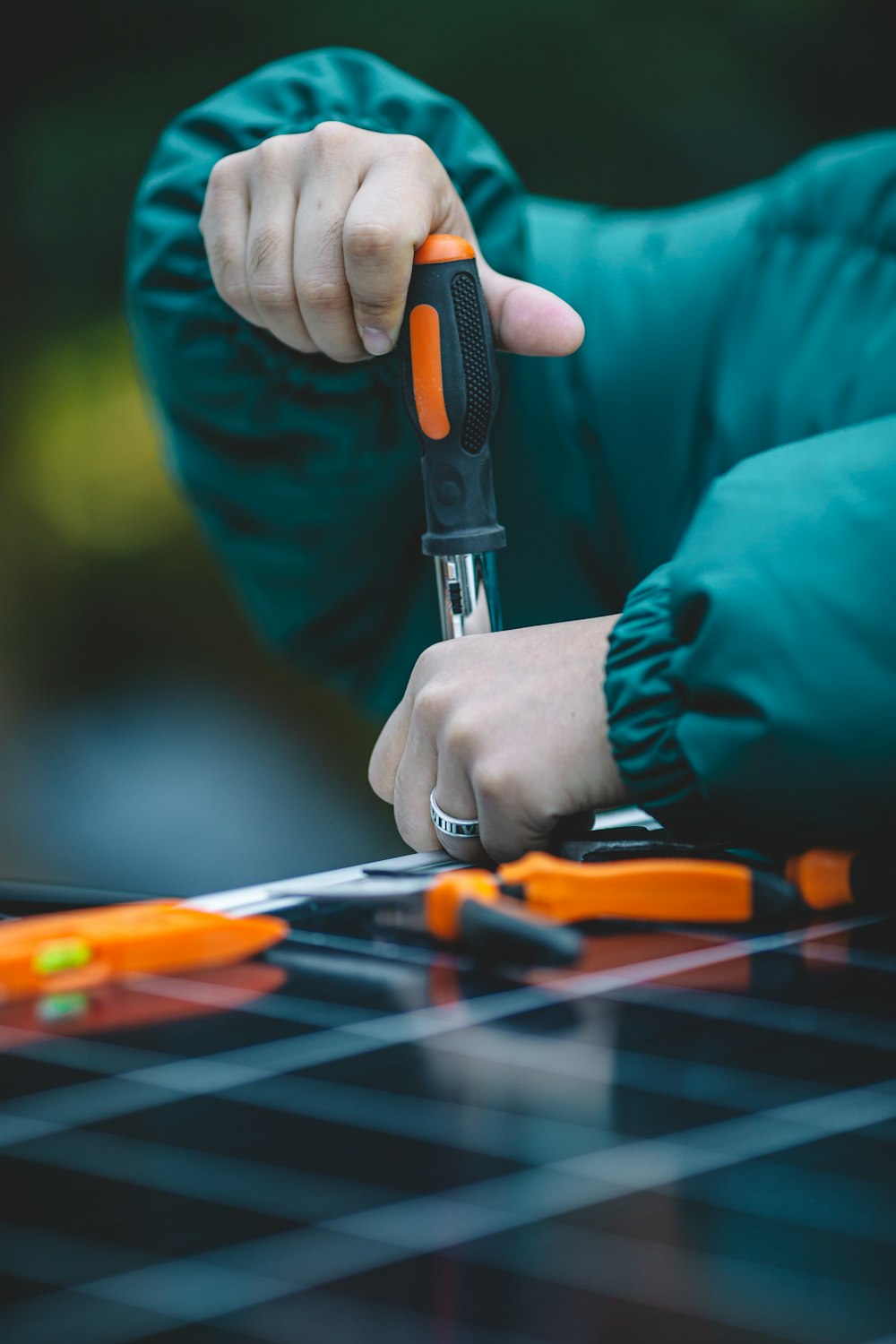 a person holding a tool