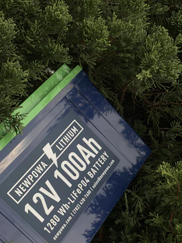 a blue sign with white text