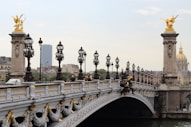 Pont Alexandre III with statues on it