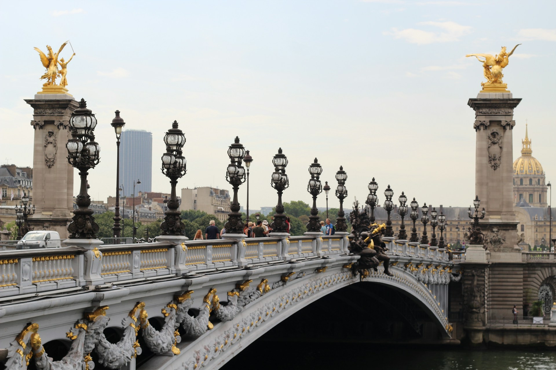 Pont Alexandre III with statues on it