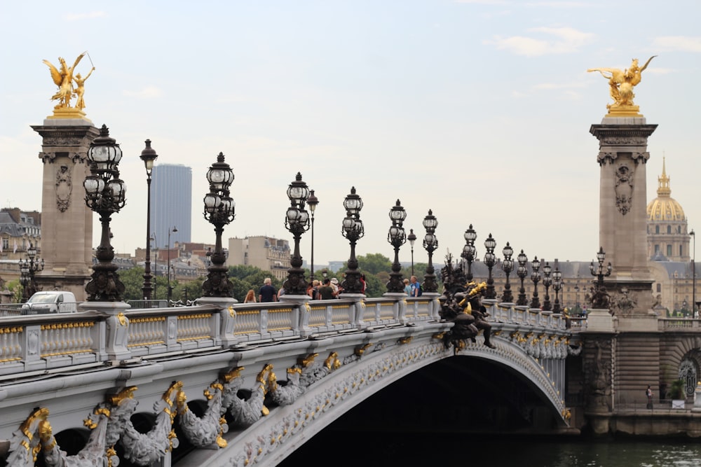 Pont Alexandre III with statues on it