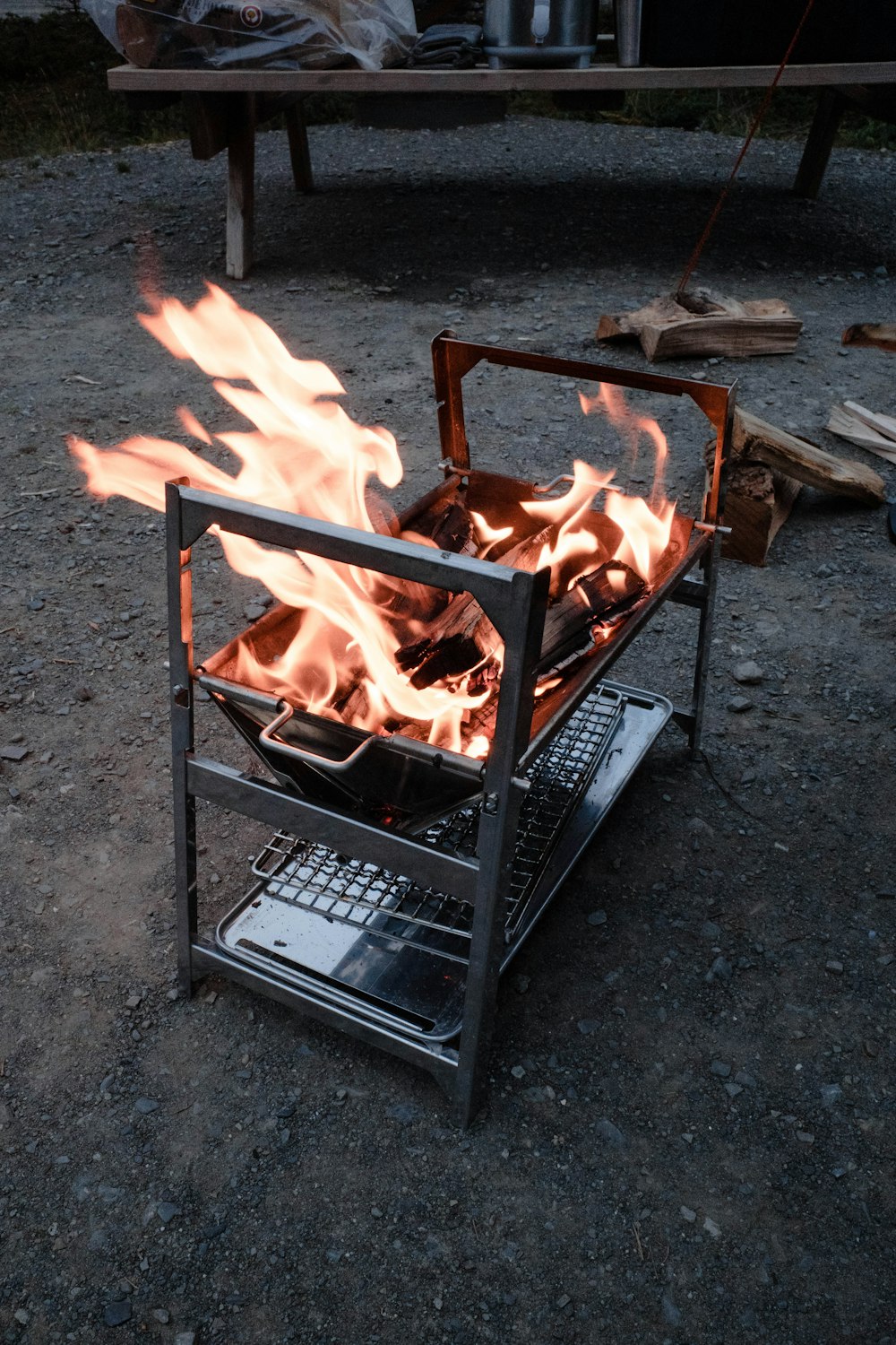 a grill with a fire inside