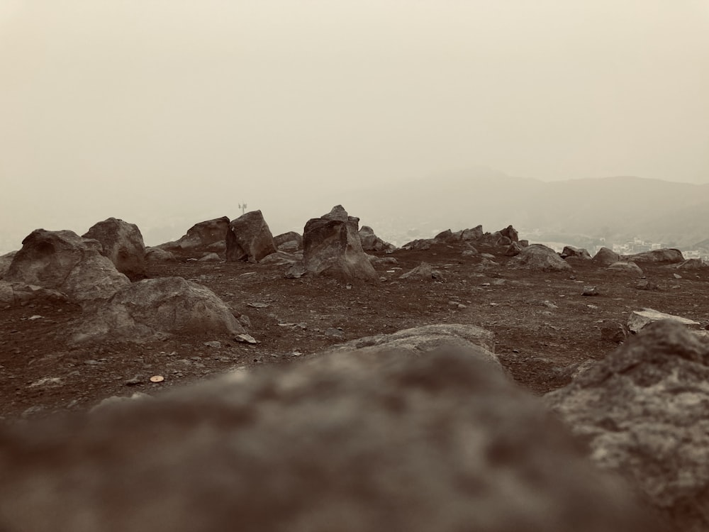 a rocky landscape with a river running through it