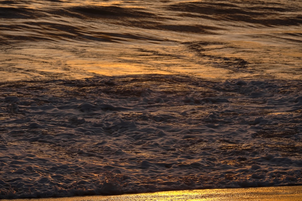 a sunset over a beach