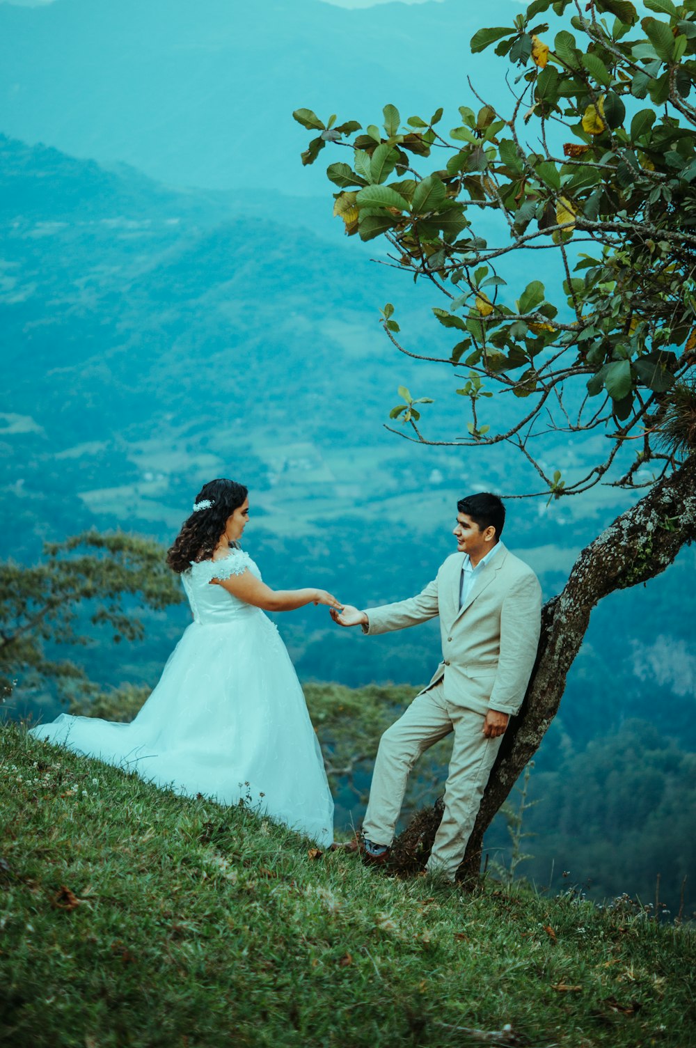 a man and woman holding hands