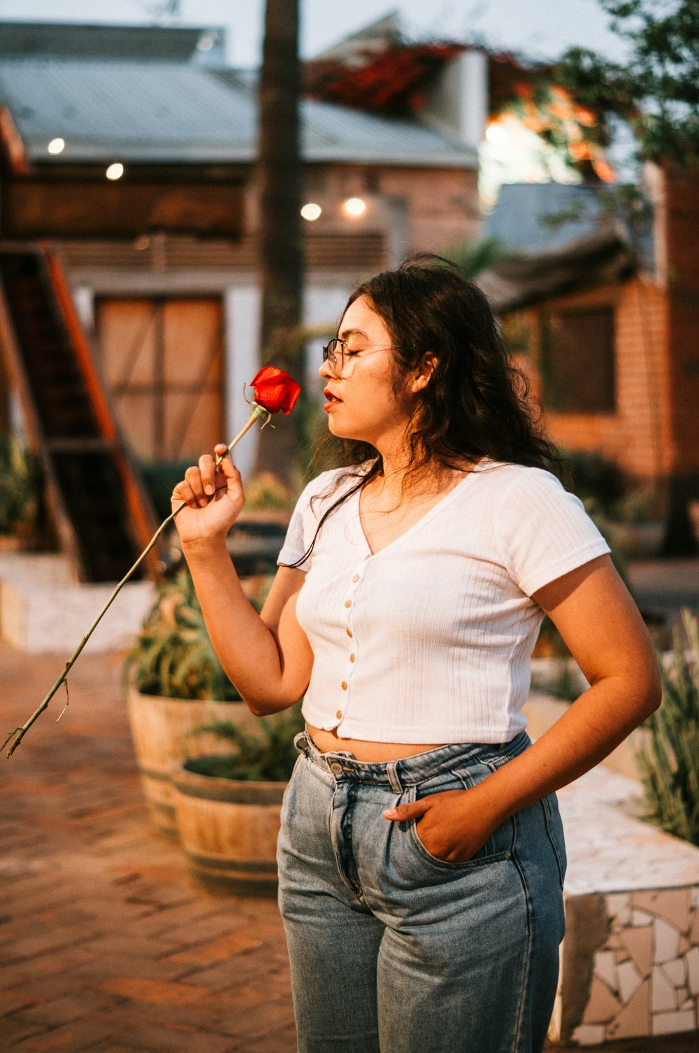 a person holding a rose