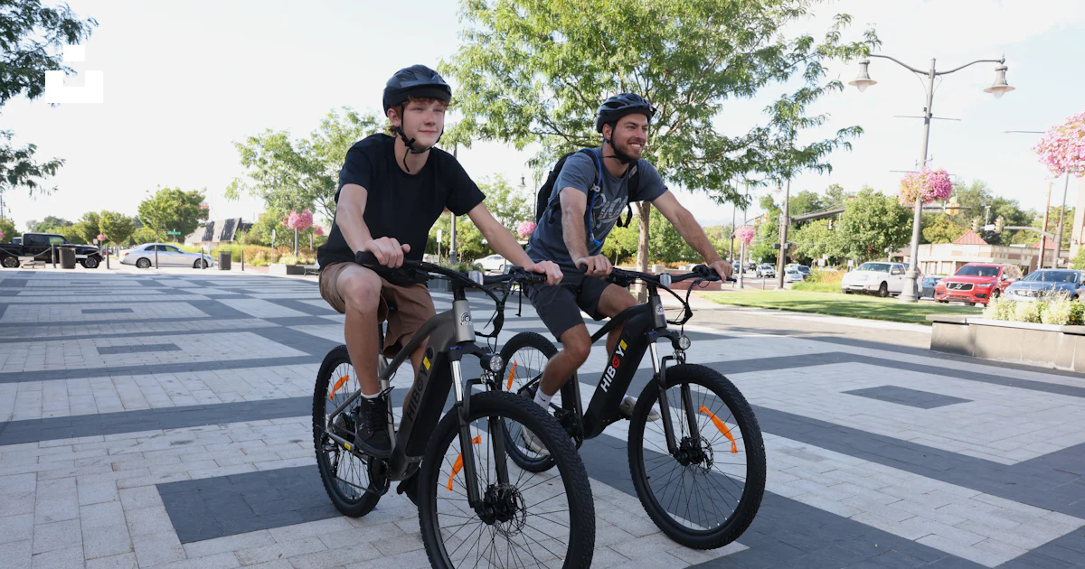 Two men riding bikes photo – Free Bikenation Image on Unsplash