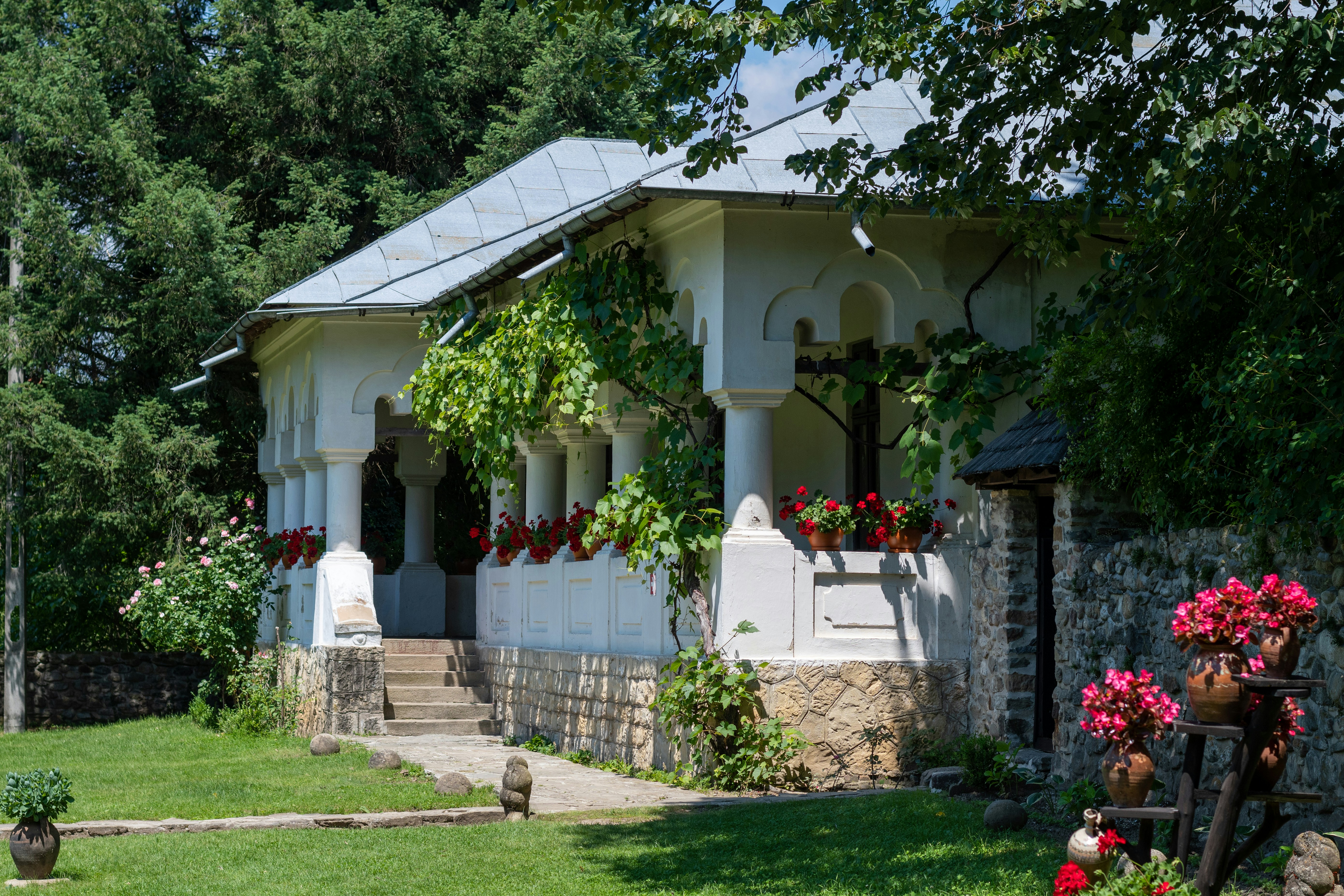 a white house with a large front yard