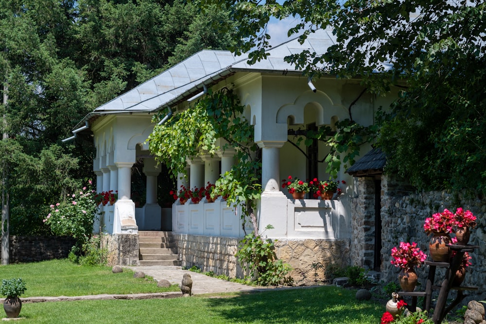 a white house with a large front yard