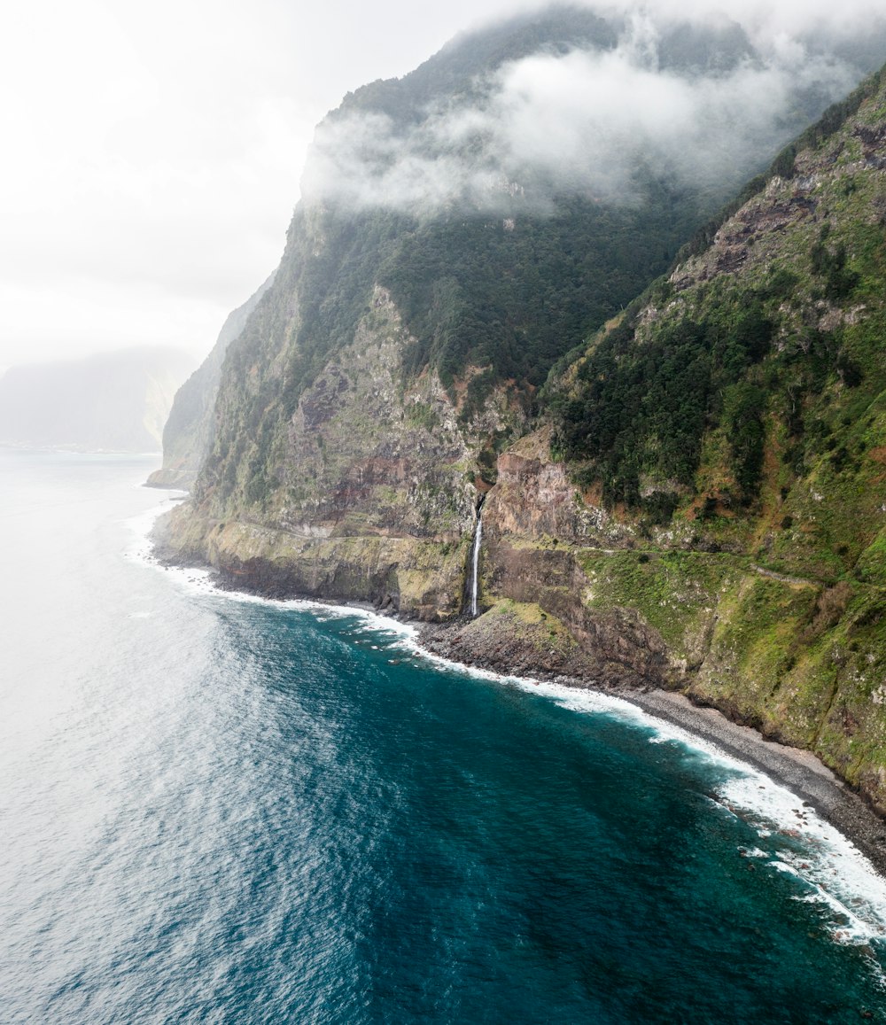 a waterfall on a cliff