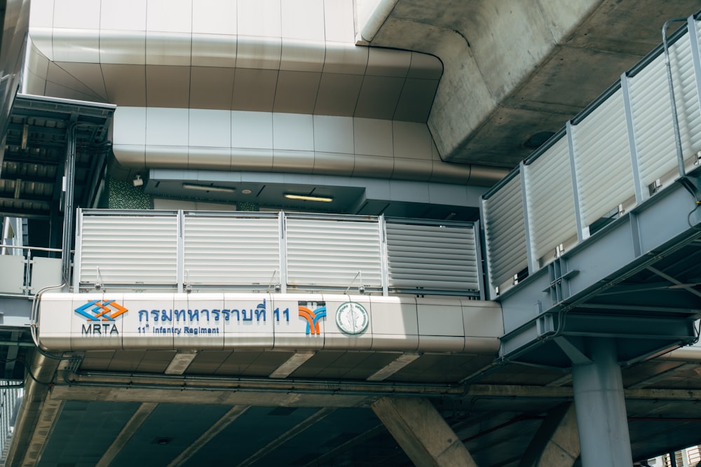 a train station with a sign