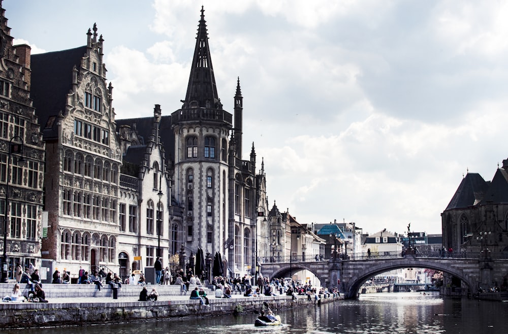 a bridge over a river with buildings on either side of it