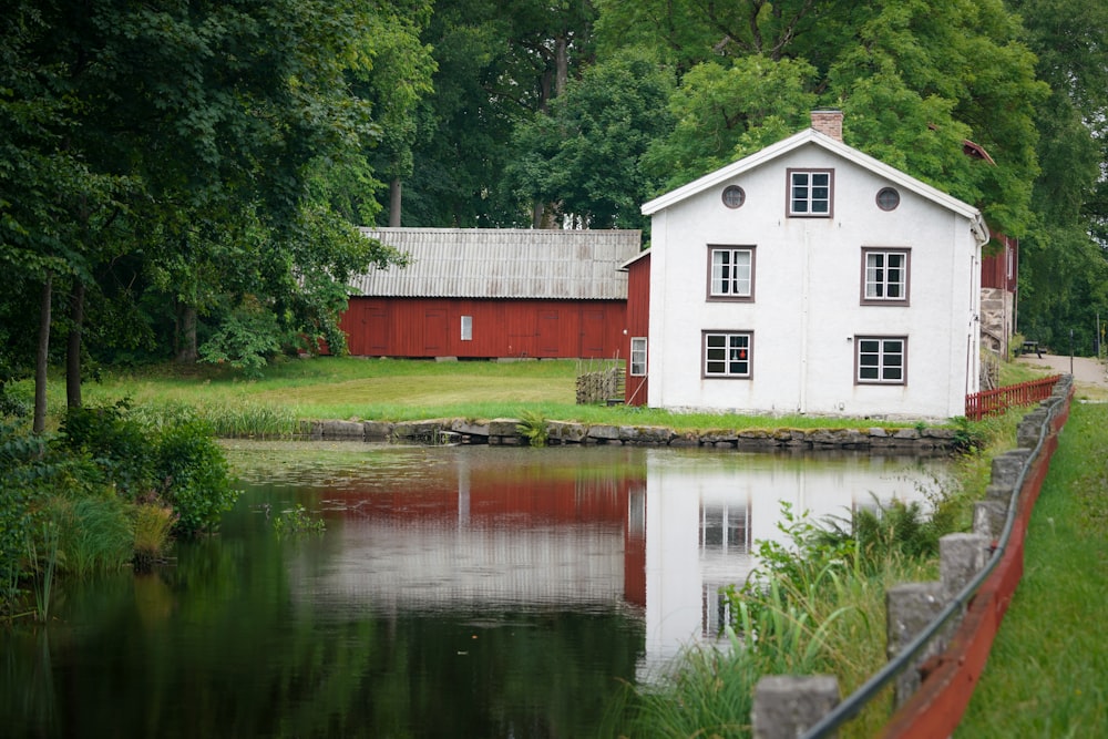 a house next to a pond