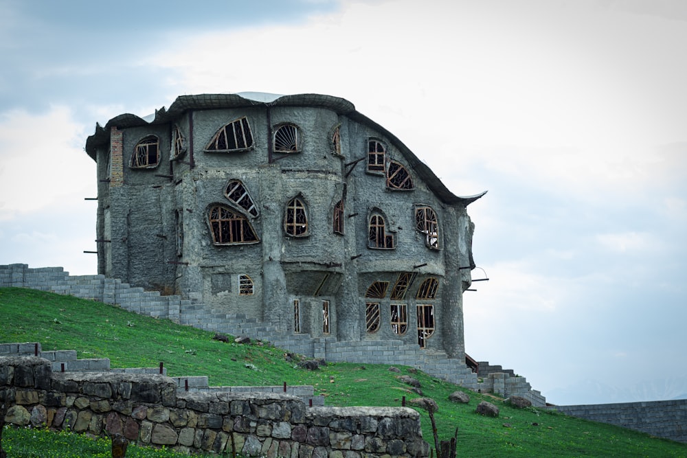 a stone building with a stone wall