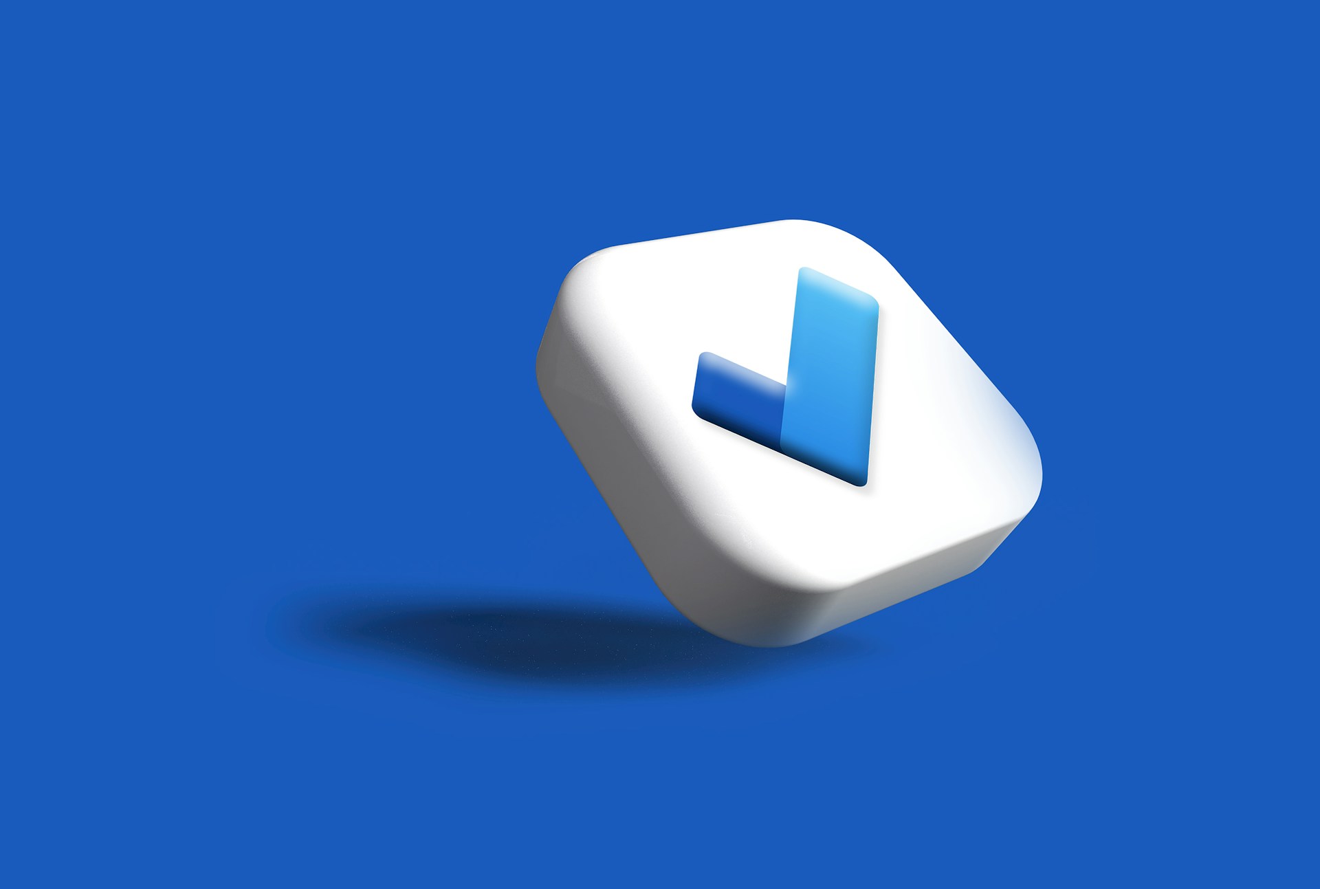 a white cube with a blue square