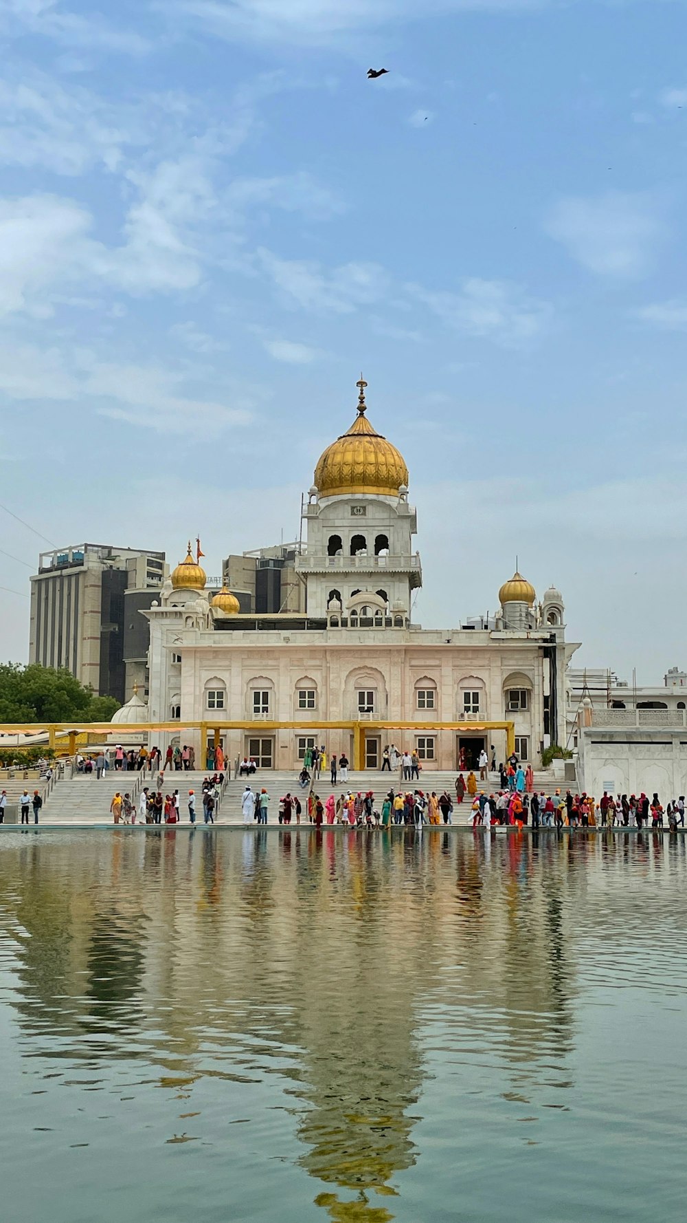 a large building with a domed roof and a gold domed roof